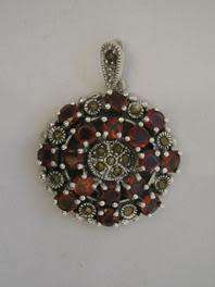 Beautiful Sterling Silver , Marcasite and Garnets Pendant